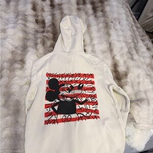 Cream Hoodie with Cartoon Graphic